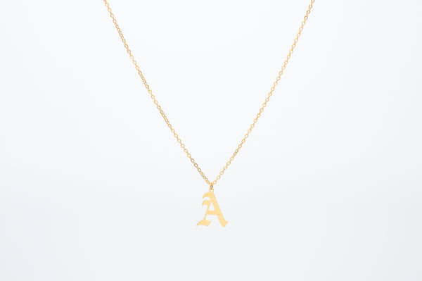 Old English Gothic Font uppercase capital letter alphabet Necklace crafted on a dainty cable chain. Length: 43cm. Made from stainless steel, choose from 18k Gold plated or Silver, tarnish free.