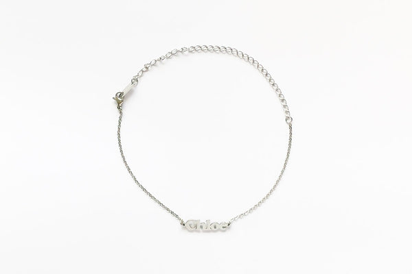 Custom Name Anklet in a block font, crafted onto our minimalistic cable chain. Chain Length: 18cm + 10cm Extender Chain. Made with stainless steel, silver. Perfect gift for her / friendship gifts.