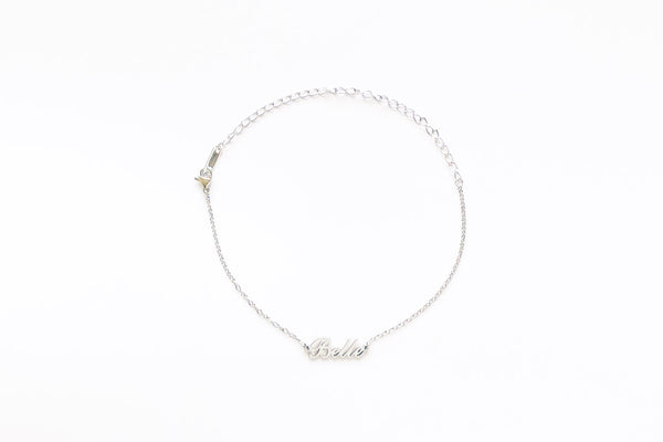 Custom Name Anklet in a cursive, italic style font, crafted onto our minimalistic, dainty cable chain. Chain Length: 18cm + 10cm extender chain. Made with stainless steel, silver. Perfect gift for her / friendship gifts.